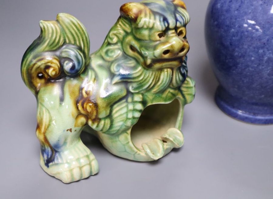 A Chinese powder blue vase, 23cm, Chinese crackleware bowl, 10cm diameter and an earthenware Buddhistic lion